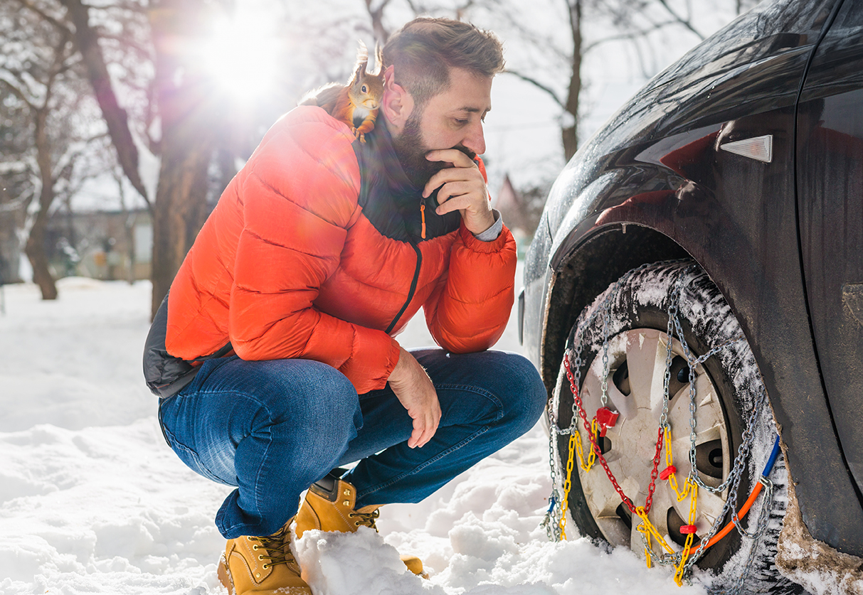Confused,Man,Does,Not,Know,How,To,Put,Snow,Chains